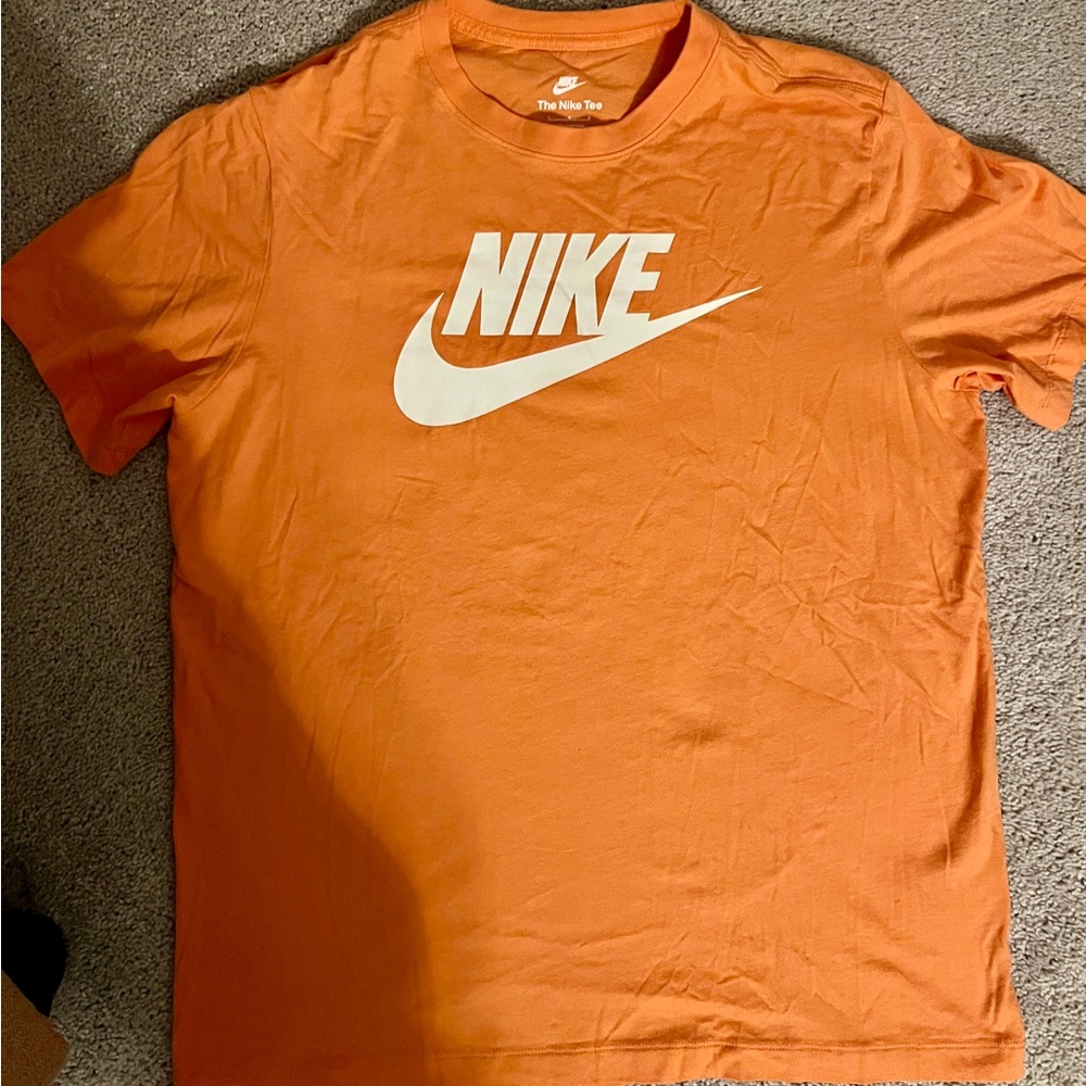 Never Worn Nike T. Orange Trance. Size Large Womens (Shorts not included)